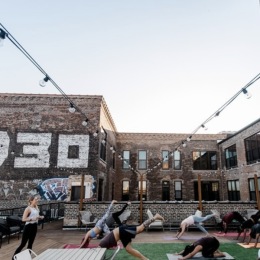 Excited for a year of connections outside area with people doing yoga