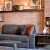 red brick walls and industrial style furnishings create a welcoming environment in lobby area