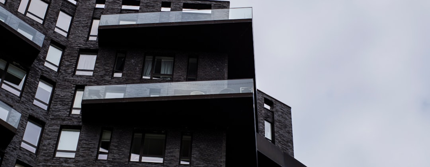 Modern rental apartments sleek high-rise exterior - Modern rental apartments