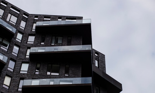 Modern rental apartments sleek high-rise exterior - Modern rental apartments